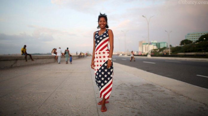 Los cubanos ya se visten con la bandera de EEUU.